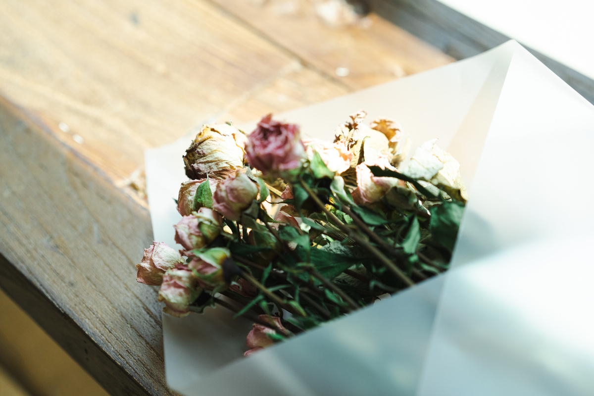 Bouquet of Wilted Flowers on Table